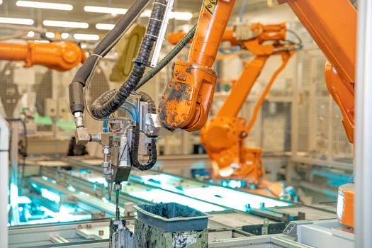 robotic arm for automated production of components for the automotive industry.