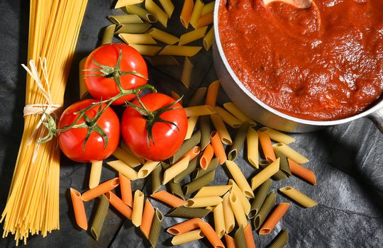 Ingredients for an Italian style meal on slate. Horizontal format.