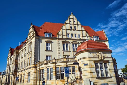 A historic, neo-Roman sandstone building in the city of Poznan