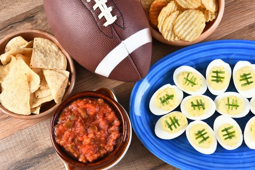 High angle view of snacks for watching a football game. Great for Super Bowl or Playoff themed projects.