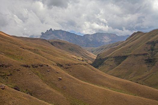 The peak known as Old Woman Grinding Corn as seen from near Grindstone Cave in the Maloti-Drakensberg Park. South Africa