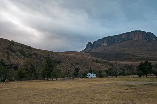 A single RV in a deserted winter campground, Mahai Campground, Royal Natal National Park. Kwa-Zulu Natal. South Africa