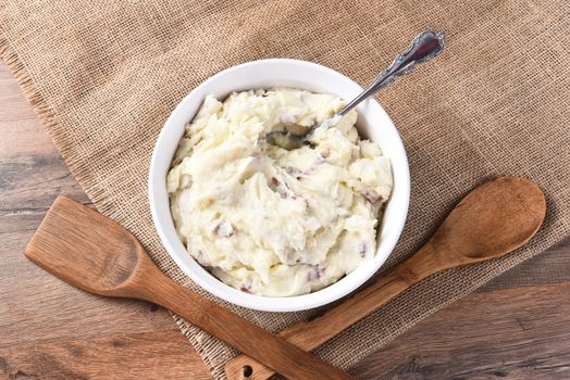 Overhead view of a bowl of mashed potatoes.