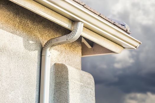 House with New Seamless Aluminum Rain Gutters.