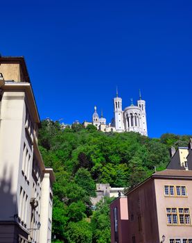 The Basilica of Notre Dame de Fourviere overlooking Lyon, France and the Saone River.