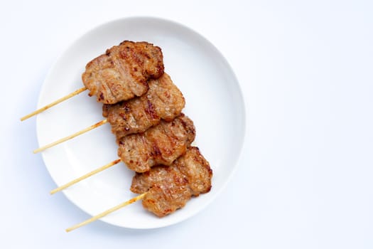 Grilled pork on white background. Top view