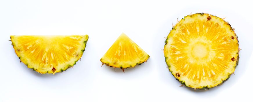 Fresh pineapple slices on white background. Top view