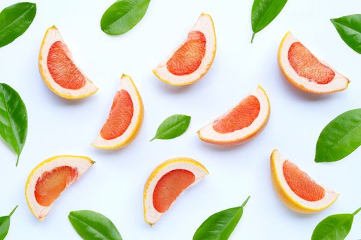 High vitamin C. Juicy grapefruit slices on white background.