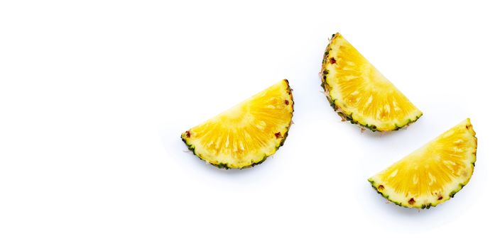 Fresh pineapple slices on white background. Top view