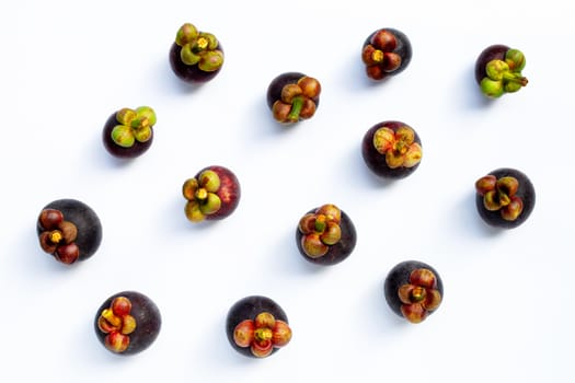 Mangosteen on white background. Top view