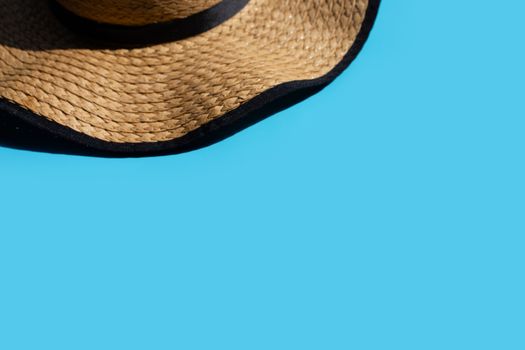 Summer hat on blue background. Enjoy holiday concept.