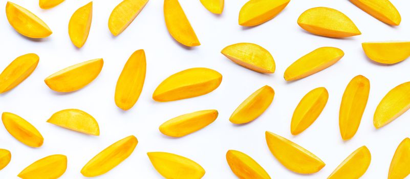 Tropical fruit, Mango slices on white background. Top view