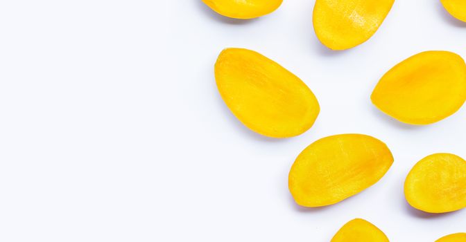 Tropical fruit, Mango slices on white background. Copy space