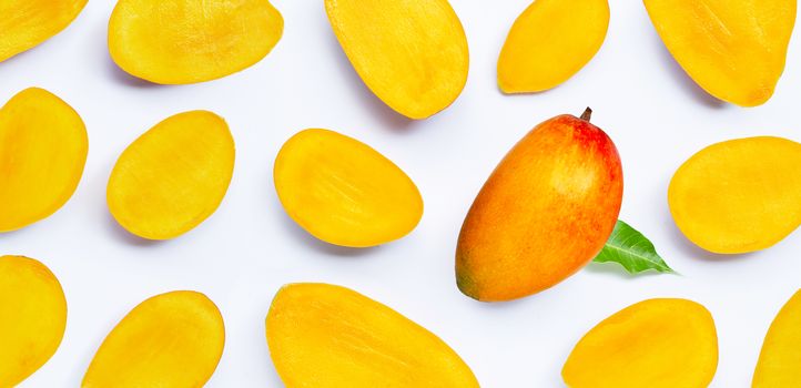 Tropical fruit, Mango slices on white background. Top view