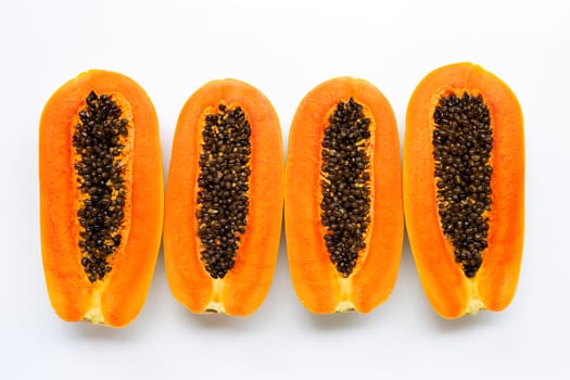 Ripe papaya fruit on white background. Top view