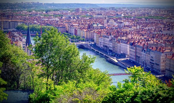 An aerial view of Lyon, France and the Saone River during morning hours.