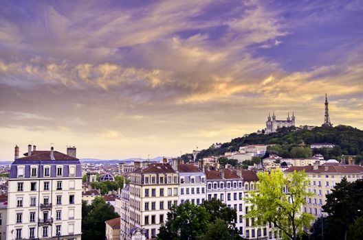 Lyon, France and the Basilica of Notre-Dame de Fourvière at sunset.