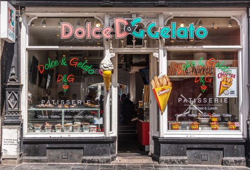 Amsterdam, the Netherlands - July 1, 2019: Dolce DG Gelato shop entrance and facade with ice cream related items on display, eatery for breakfast and lunch.