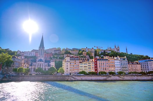 A view of Lyon, France along the Saone river in the afternoon.