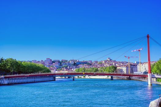 A view of Lyon, France along the Saone river in the afternoon.