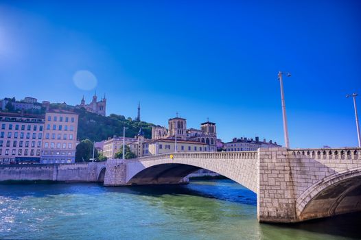 A view of Lyon, France along the Saone river in the afternoon.