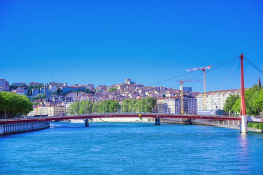 A view of Lyon, France along the Saone river in the afternoon.