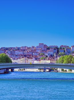 A view of Lyon, France along the Saone river in the afternoon.