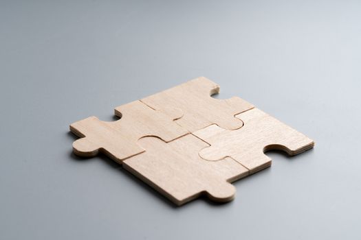 Wood puzzle for business concept