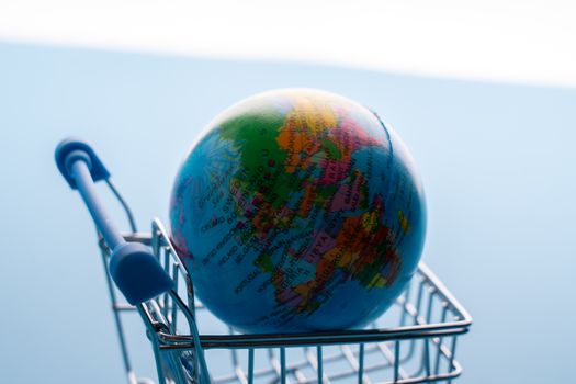 Online shopping icon with globe for global concept 