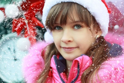 Winter outdoors portrait of the lovely girl