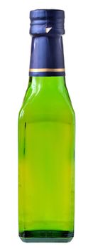 Glass bottle of vegetable olive oil isolated on a white background.