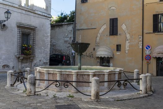 narni,italy june 29 2020 :fountain in square of priori in the center of narni village
