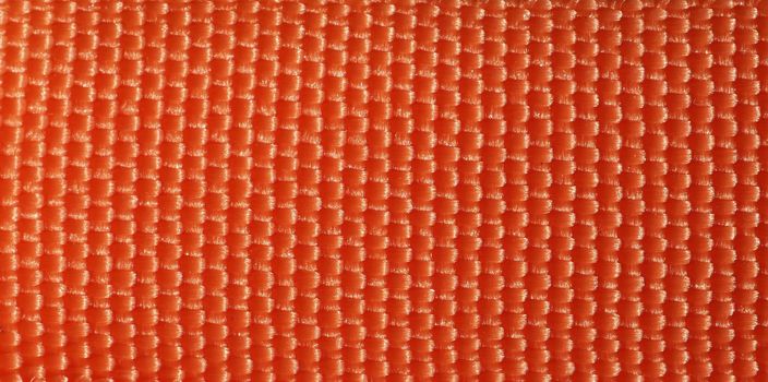 orange fabric texture useful as a background