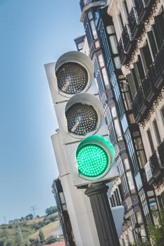 Spain traffic light shows green light for pedestrians