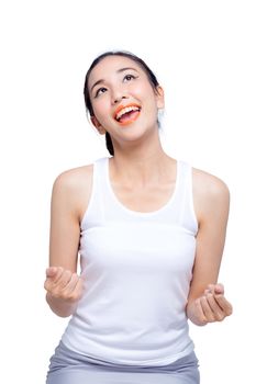 Half-length portrait of happy woman fists gesturing, isolated on white. Concept of success and victory