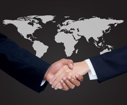 Business with people shaking hands with a global background