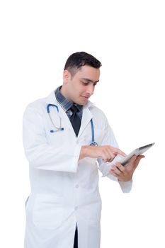 Doctor holding a tablet computer while using it isolated on white background