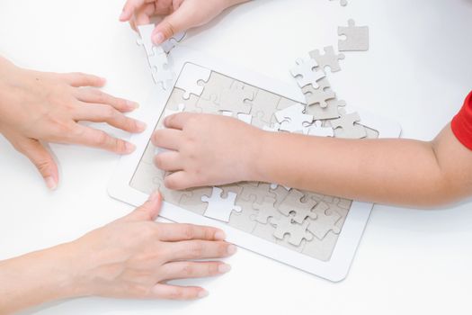 Adults and children development to jigsaw the skills, ideas, abilities