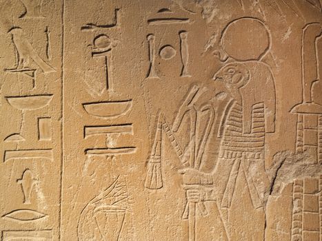 Ancient Egypt tomb hieroglyphs stone wall background