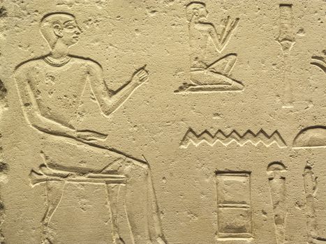 Ancient Egypt tomb hieroglyphs stone wall background