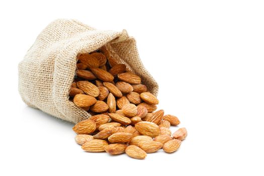 Almonds in a sack of cloth on a white background