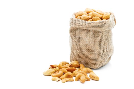 Cashews in a sack on a white background