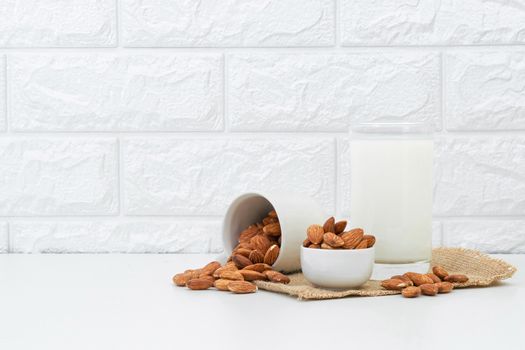 Milk Almonds in a glass on a white background