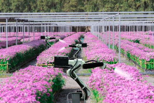 Automatic agricultural technology robot arm watering plants flower garden