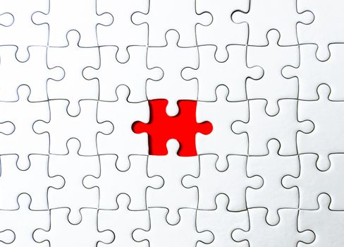 Fill the missing parts fragment of white jigsaw concept puzzle for succeed