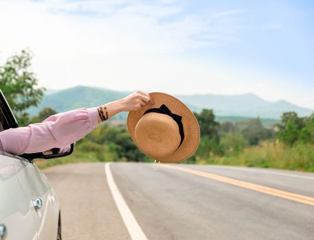 Woman driving on the road Travel by car relax