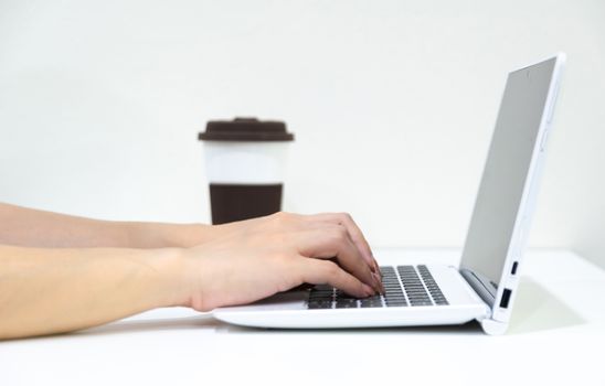 Business people working with computers in white background