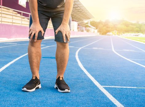 Men run exercise stop tired and breathless