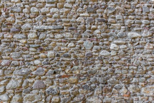 Background of textured stones on wall