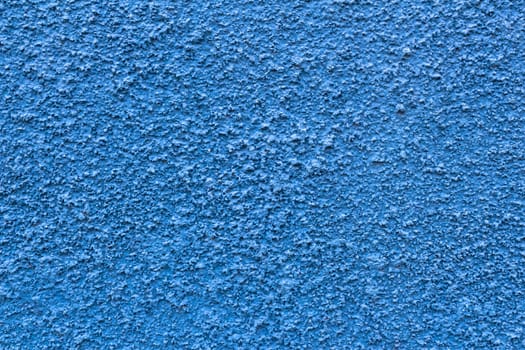 Abstract deep blue wall plastered texture. Rustic background.